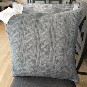 Grey sweater throw pillow